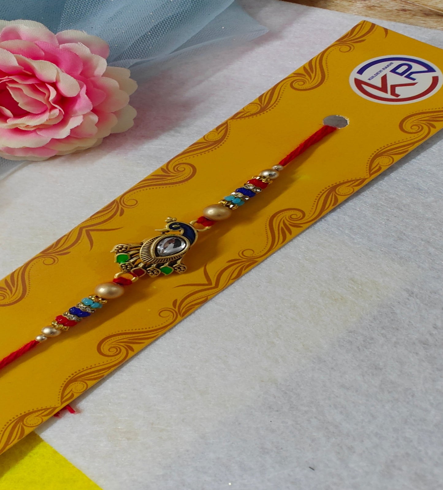 KIDS RAKHI - Peacock Charm Rakhi Golden