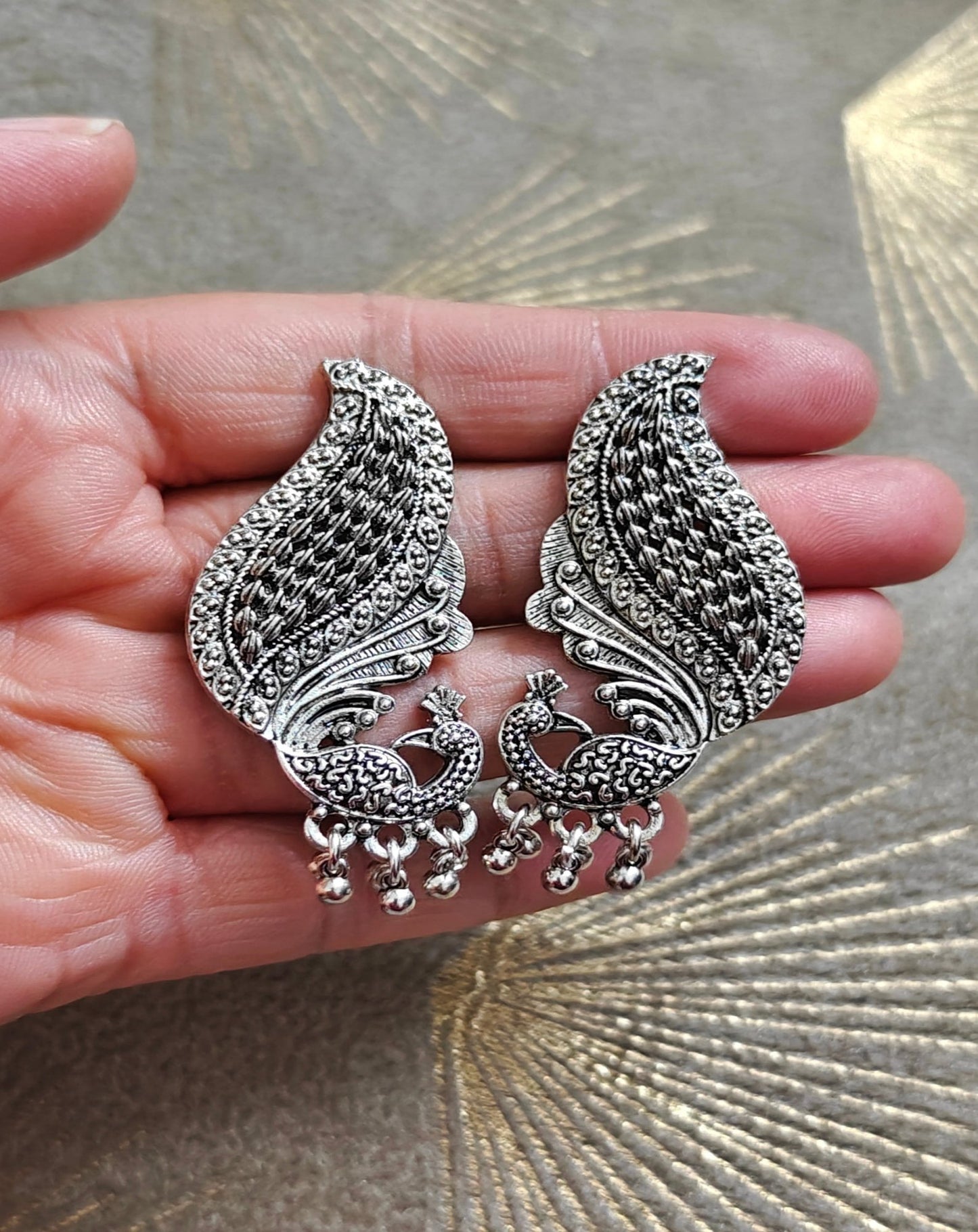 SILVER PEACOCK STUDS