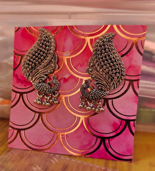 SILVER PEACOCK STUDS